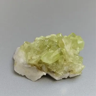 Brazilianite crystals in druse 71.7g, Brazil