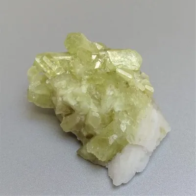 Brazilianite crystals in druse 71.7g, Brazil