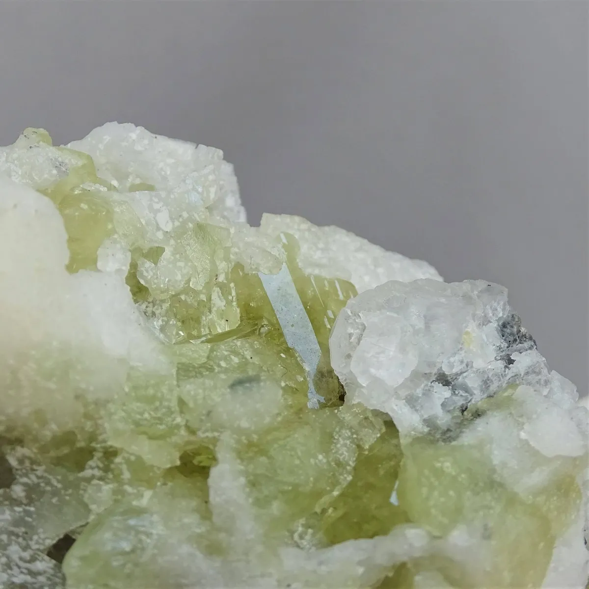 Brazilianite crystals in druse 206g, Brazil