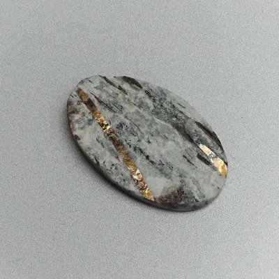 Astrophyllite cabochon natural unpolished mineral 10.1g, Russia