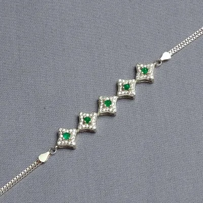 Silver bracelet with emeralds and zircons