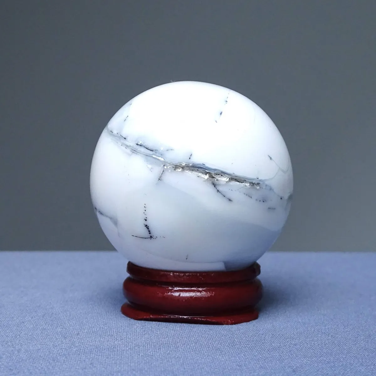Dendritic opal (merlinite) ball 155g, Madagascar