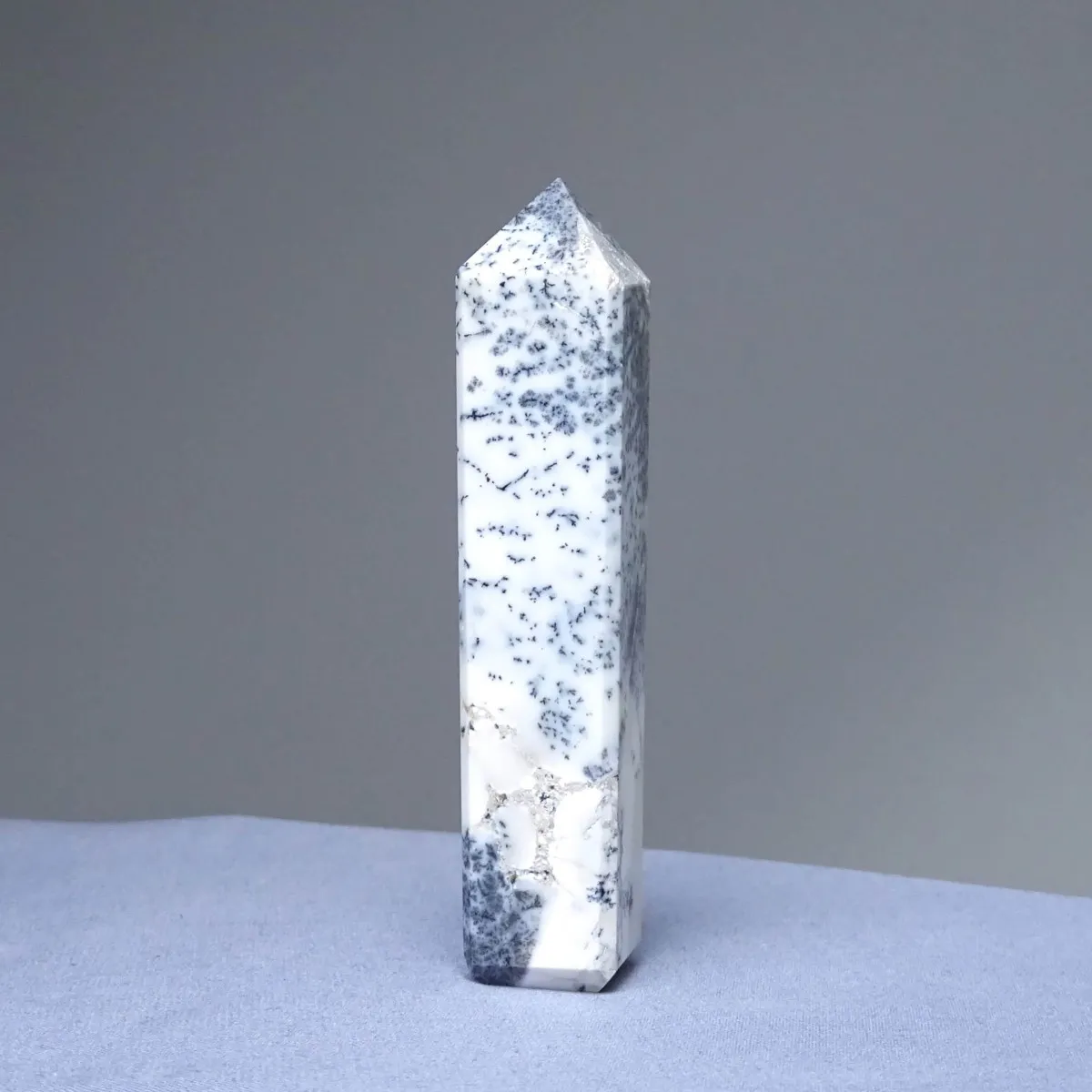 Dendritic opal (merlinite) obelisk 110g, Madagascar